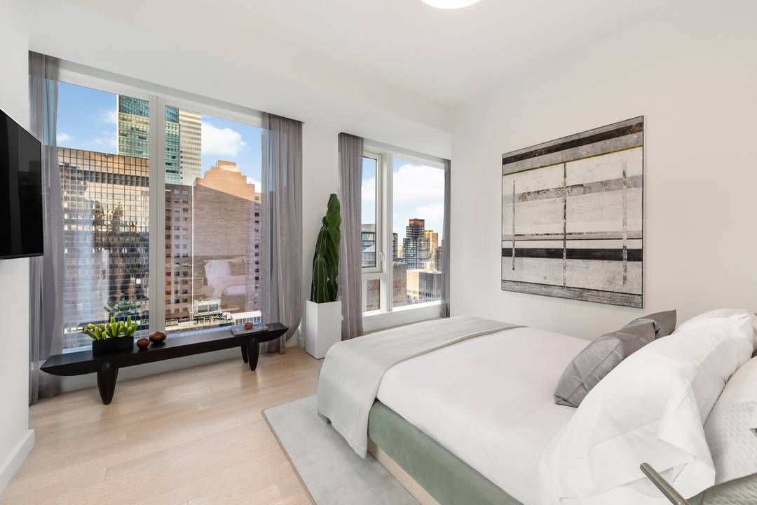 Immediate Occupancy This expansive two bedroom, two bathroom residence designed by Champaulimaud offers southern and north eastern exposures through floor to ceiling windows.
