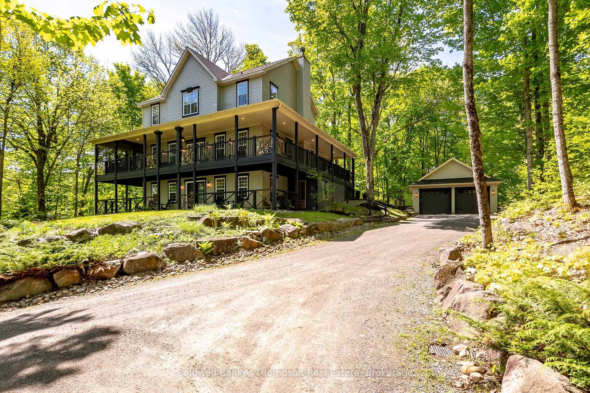 Tucked into the peaceful Woodland Heights community, this striking executive home offers the perfect blend of privacy, space, amp ; refined living.