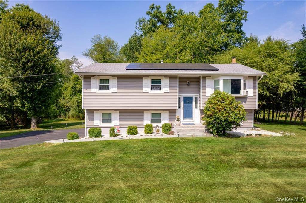 Welcome to this beautifully maintained 4 bedroom, 2 full bath bi level home, tucked away on a quiet cul de sac and surrounded by natural privacy.