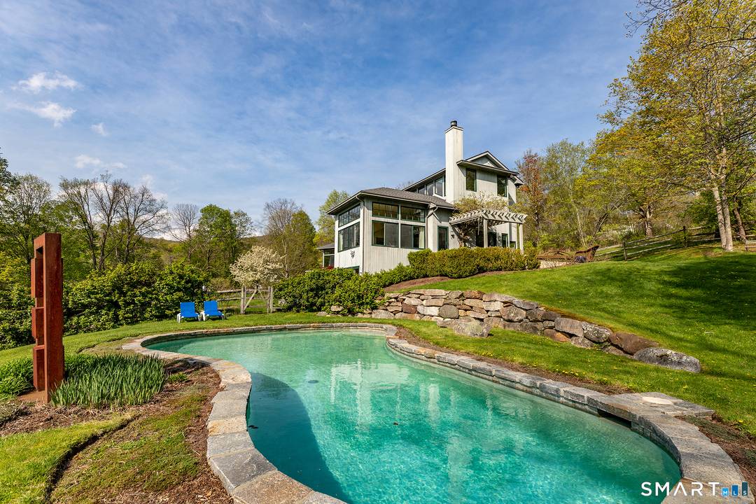 Experience the ultimate August retreat at 16 Anderson Acres Road, a contemporary masterpiece perched in the heart of Kent.