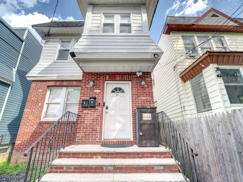 Excited to present this charming two family residence in Newark now on the market and move in ready.