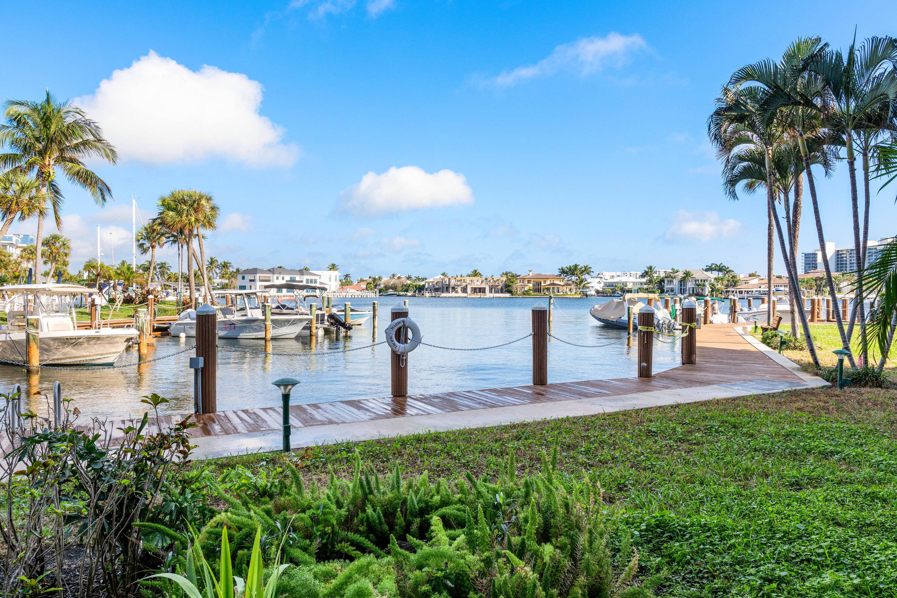 This rare first floor center unit offers 1282 square feet of beautifully updated living space and the ultimate convenience of walking right out to the gated pools and boat docks ...