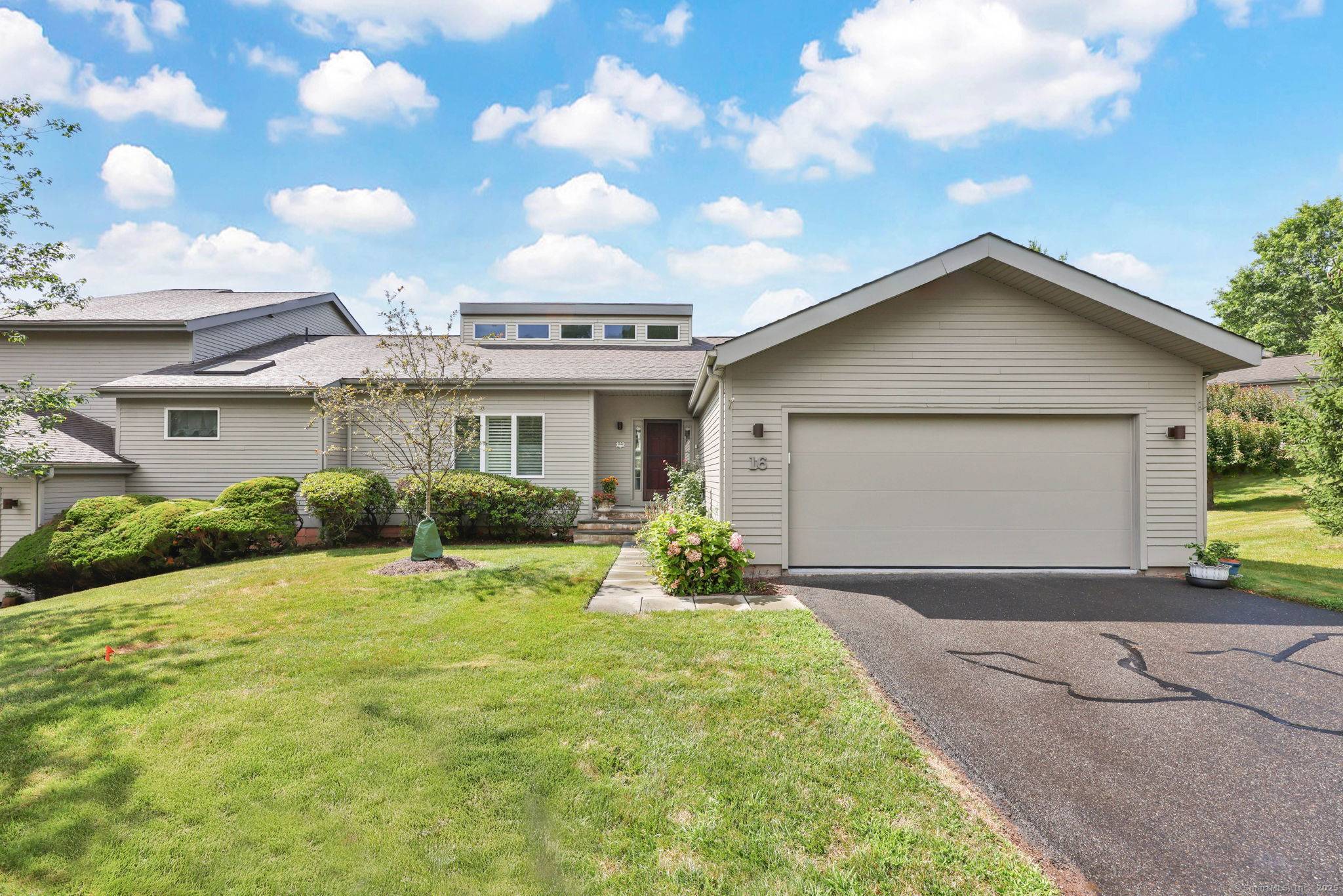 Experience effortless style, sprawling ranch style living, and truly low maintenance ease in this expansive condo in Avon's coveted Hunter's Run.