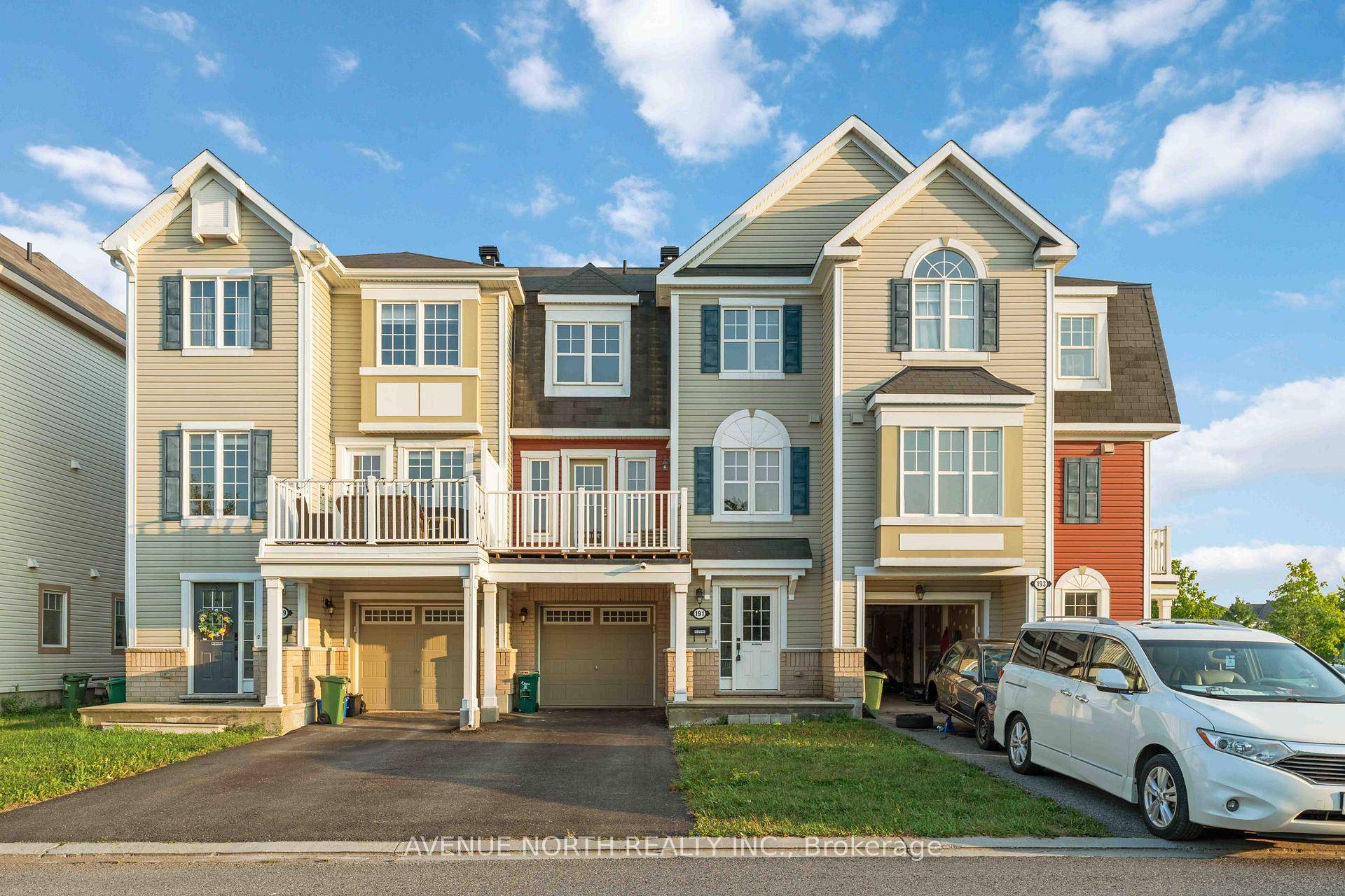 This bright and modern 3 storey back to back townhome offers 2 bedrooms, 1.