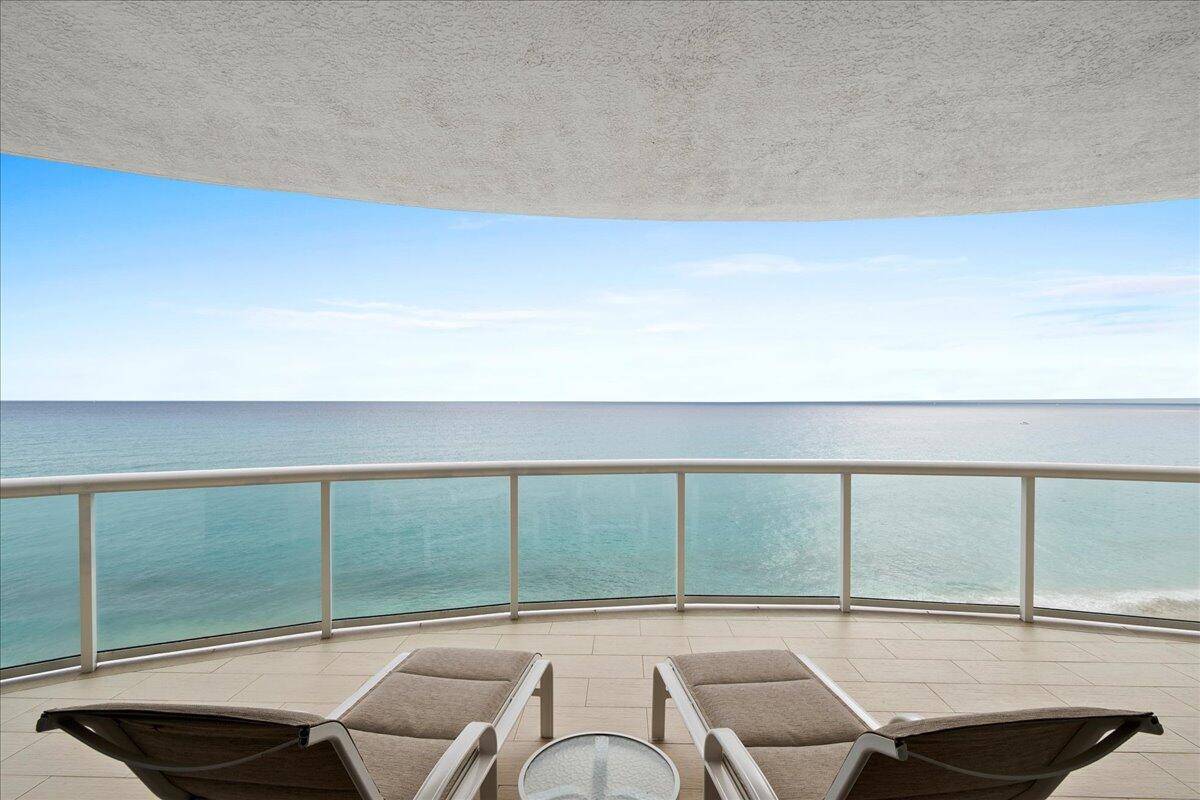 FULLY FURNISHED EXCLUDING ARTWORK BEACHFRONT RESIDENCE OFFERING TRULY DIRECT UNOBSTRUCTED VIEWS OF SINGER ISLAND'S ATLANTIC OCEAN.