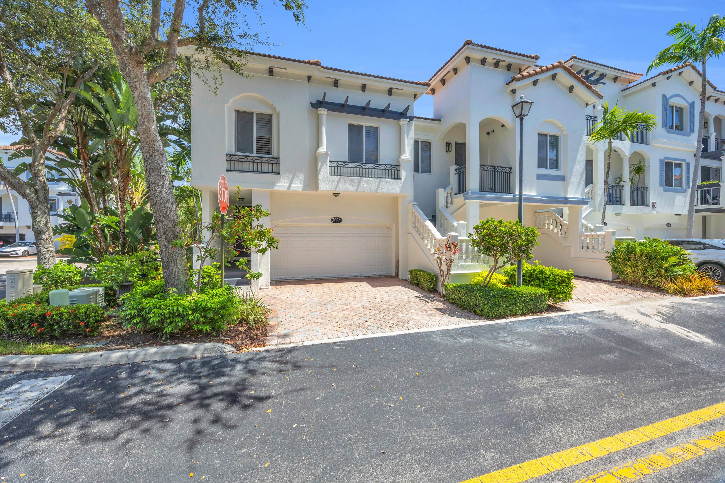 Welcome to this beautifully appointed corner unit in the sought after Waterside community where charm, space, and lifestyle come together seamlessly.