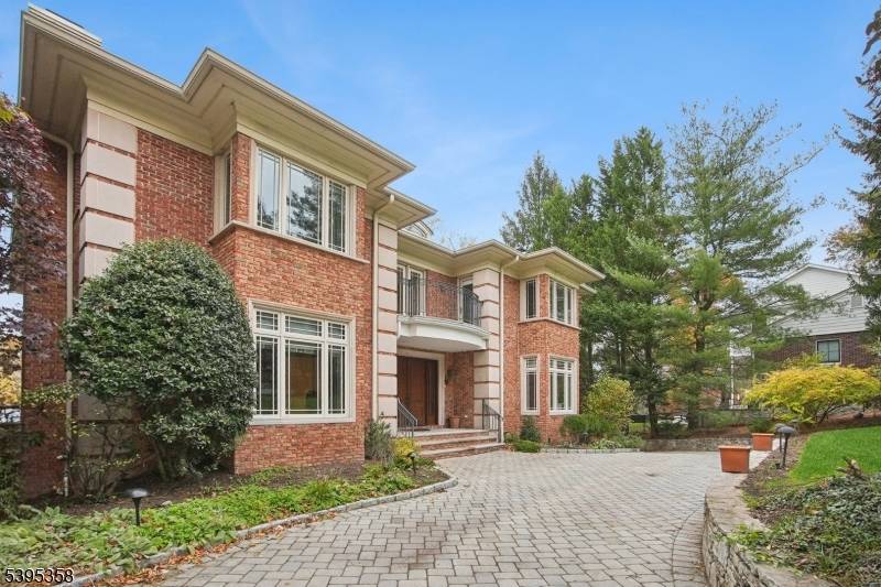 Sited in the prestigious Fairfield section of Short Hills, this stunning custom home blends timeless architecture with modern sophistication.