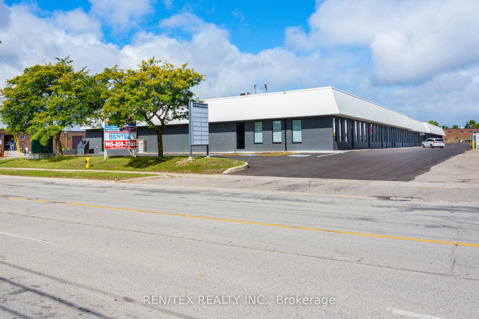 Industrial Unit With 12'x12' Drive In Shipping Door.