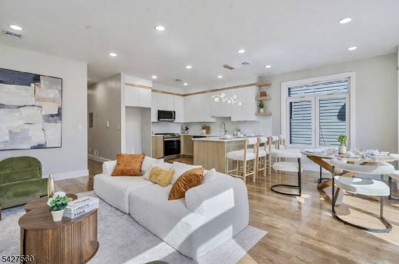 A statement of sophistication and craftsmanship, this custom new construction two family residence redefines modern living in Irvington, NJ.