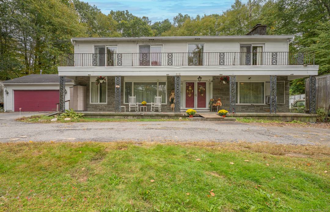 Welcome to this distinctive property showcasing wrought iron imported from Spain and a grand open foyer with double staircases.