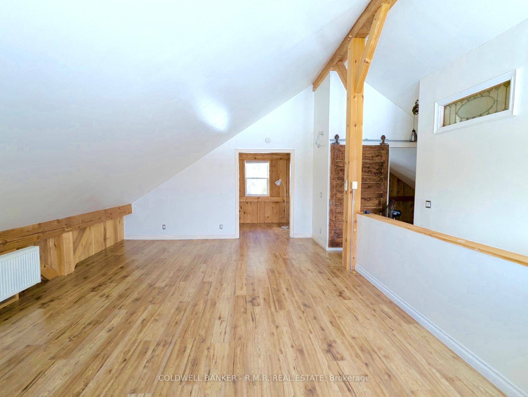 Sun drenched, post and beam, one bedroom loft apartment in Uxbridge with a panoramic view for miles !