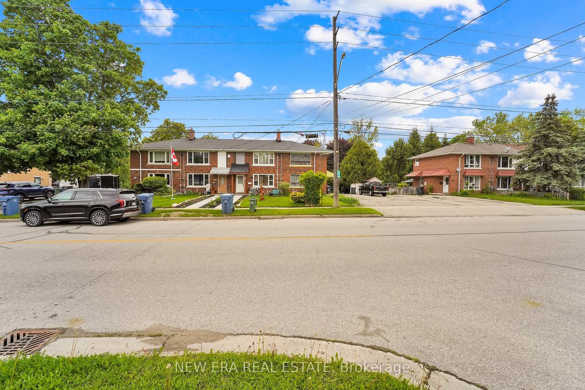 Freehold 2 storey end unit townhouse with all brick exterior backing onto beautiful Windsor Park in the City of Guelph, Featuring 2 bedrooms with full bath on second level and ...