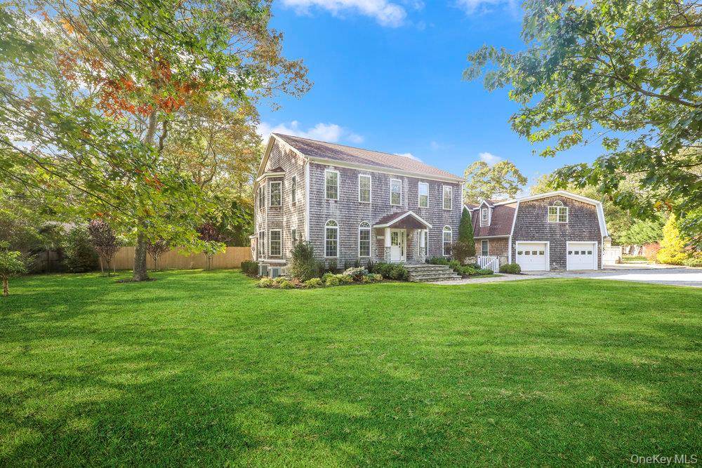 Welcome to your dream home in the heart of East Quogue !