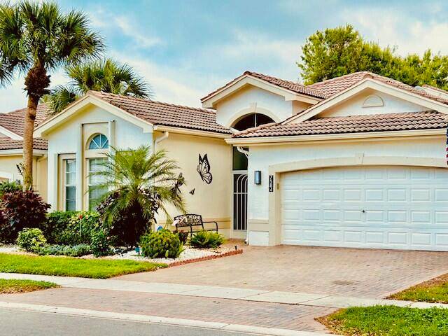 Spacious Mediterranean model, NEW BATHS, AC, UPDATED KITCHEN, meticulous, mid Century Modern flair.