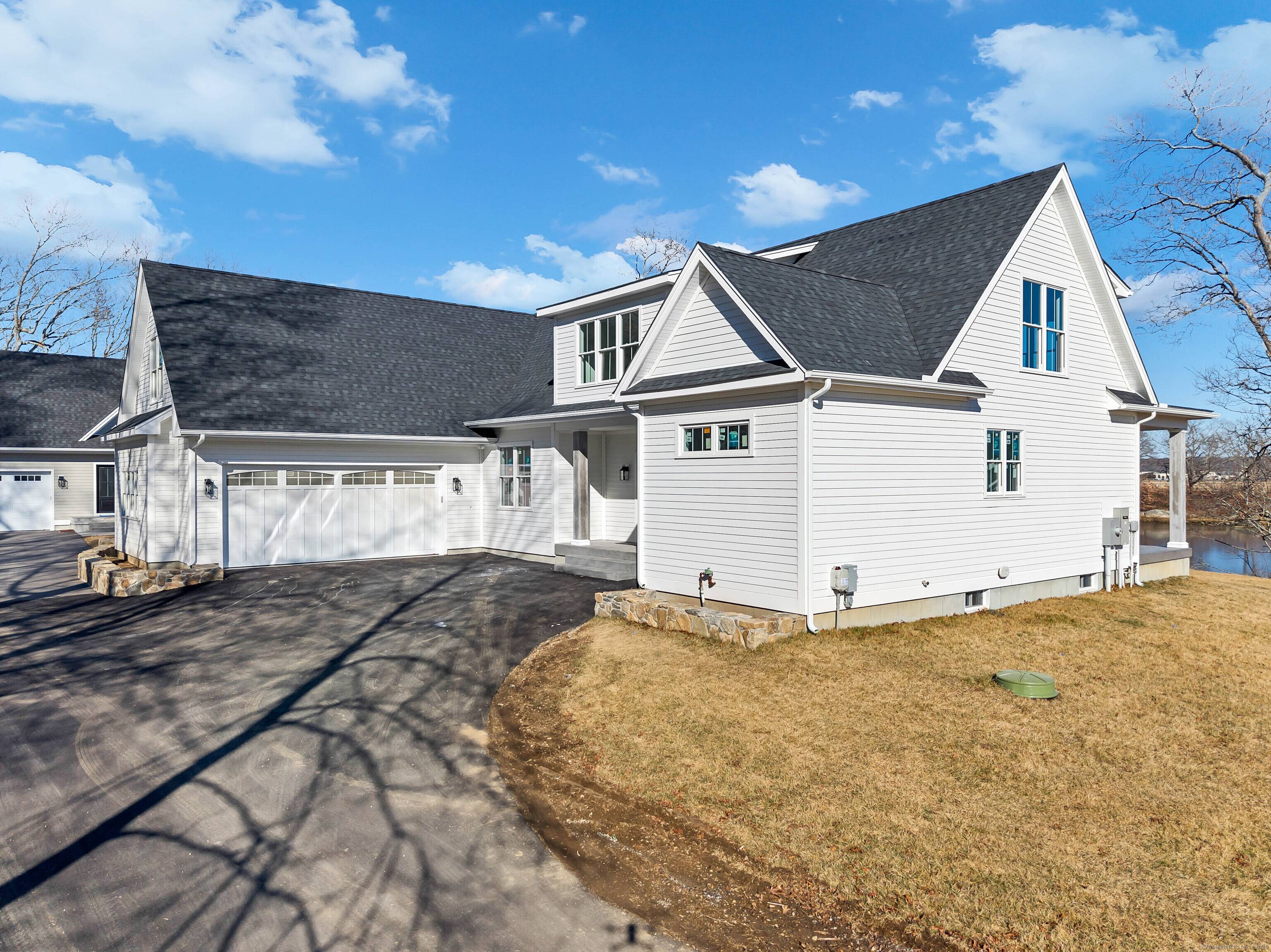Our Newest Custom Waterfront Home w a neighborhood dock in Bakers Cove.