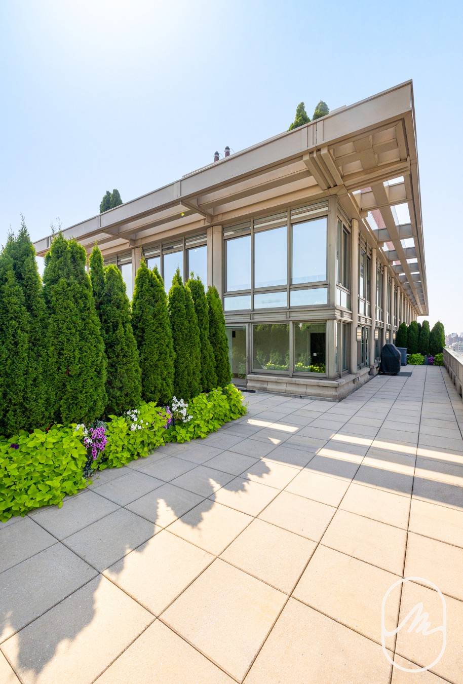 The 3 bedroom, 2. 5 bathroom penthouse featuresmassive private terrace which wraps around the entire apartment and has three exposures.