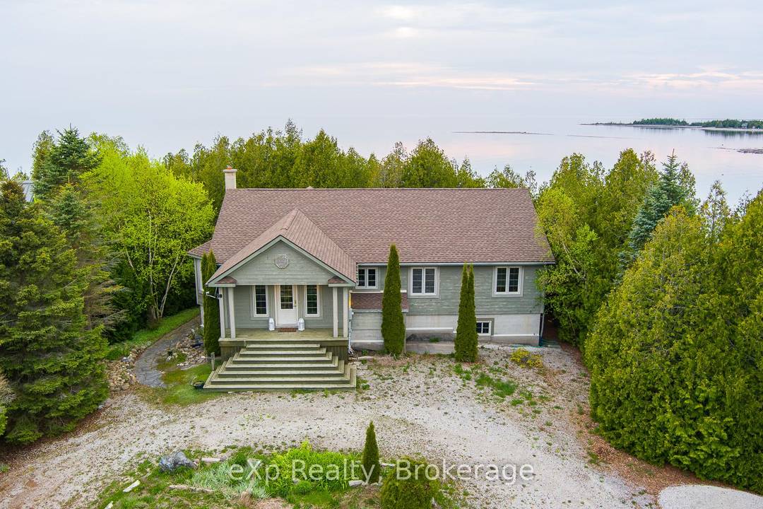 This BUNGALOW situated on the stunning WATERFRONT of Lake Huron, is impeccably designed for year round luxury offering unparalleled views and access to the water.