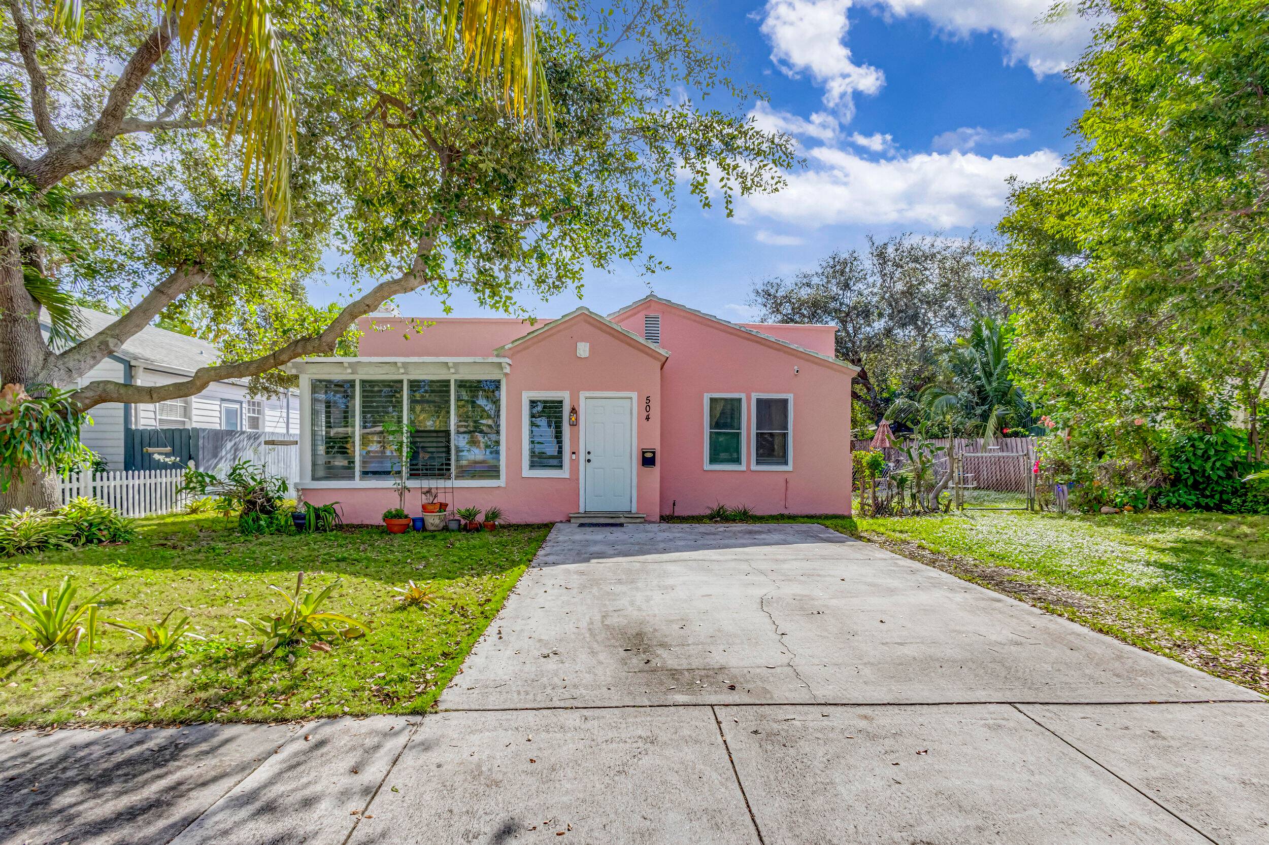 Welcome to this 1930 Spanish charmer located on an adorable Oak lined street just blocks from the intra coastal in the chic, extremely desirable Northwood neighborhood.