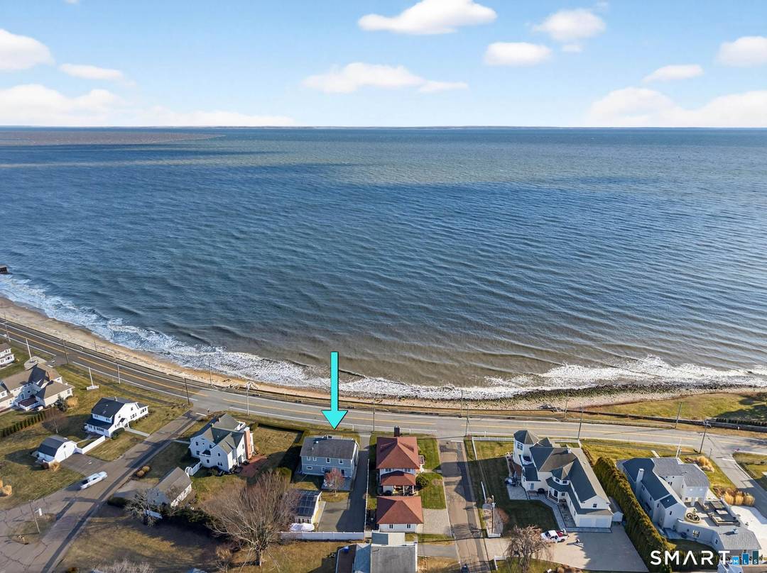 Wake up to sweeping views of Long Island Sound in this beautifully rebuilt Knollwood Beach home, designed for effortless coastal living.