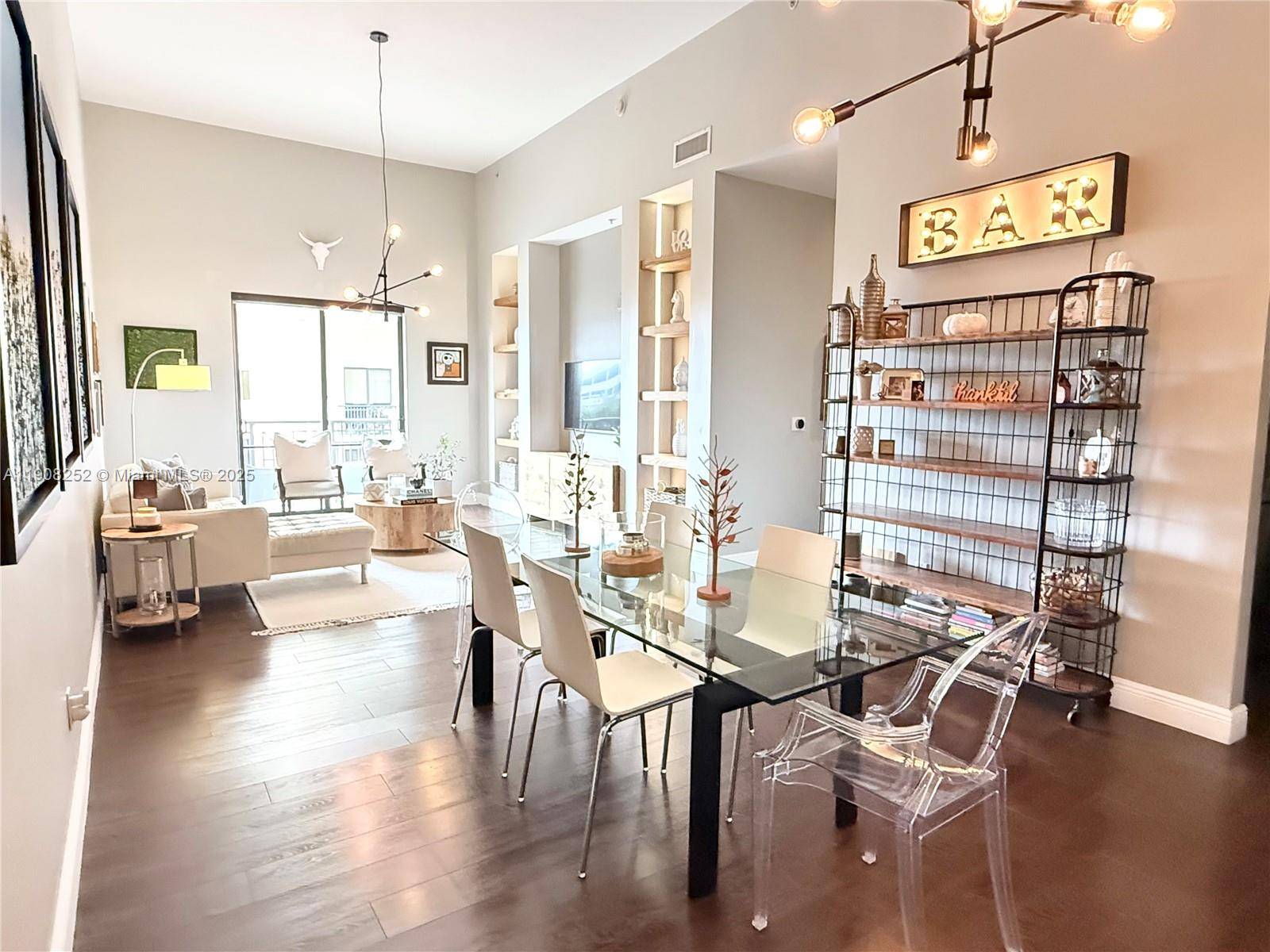 This bright, impeccably maintained 2 bedroom, 2 bath condo features soaring 13 foot ceilings, open floor plan filled with natural light, a stylish kitchen with granite countertops and stainless steel ...