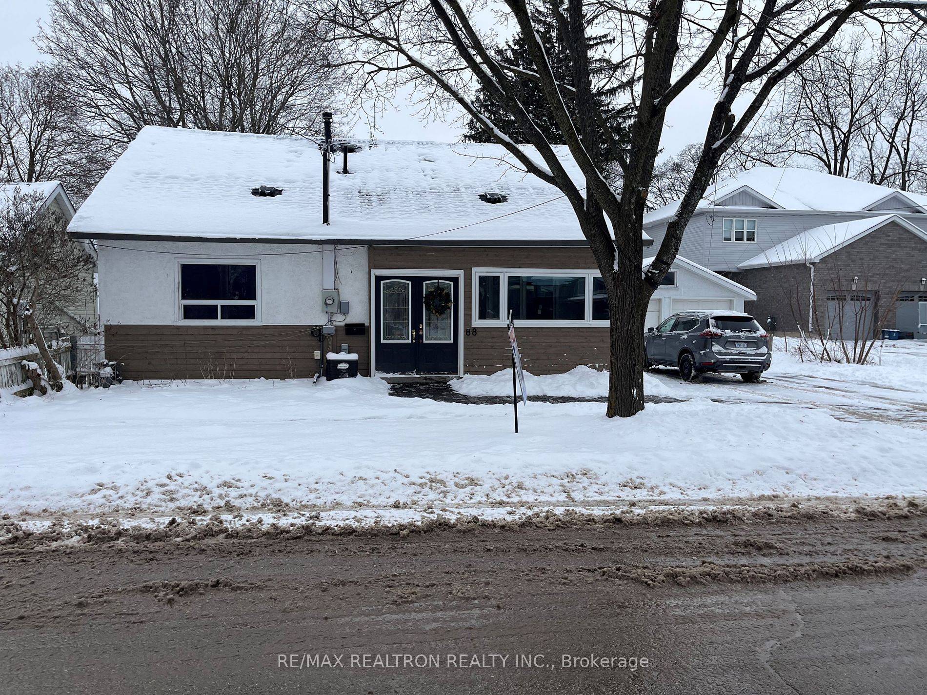 Existing triplex with separate basement entrance.