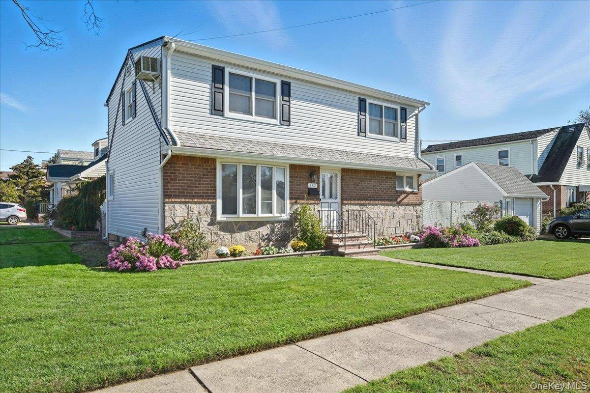 Welcome to this spacious Colonial style home nestled in the heart of Elmont !