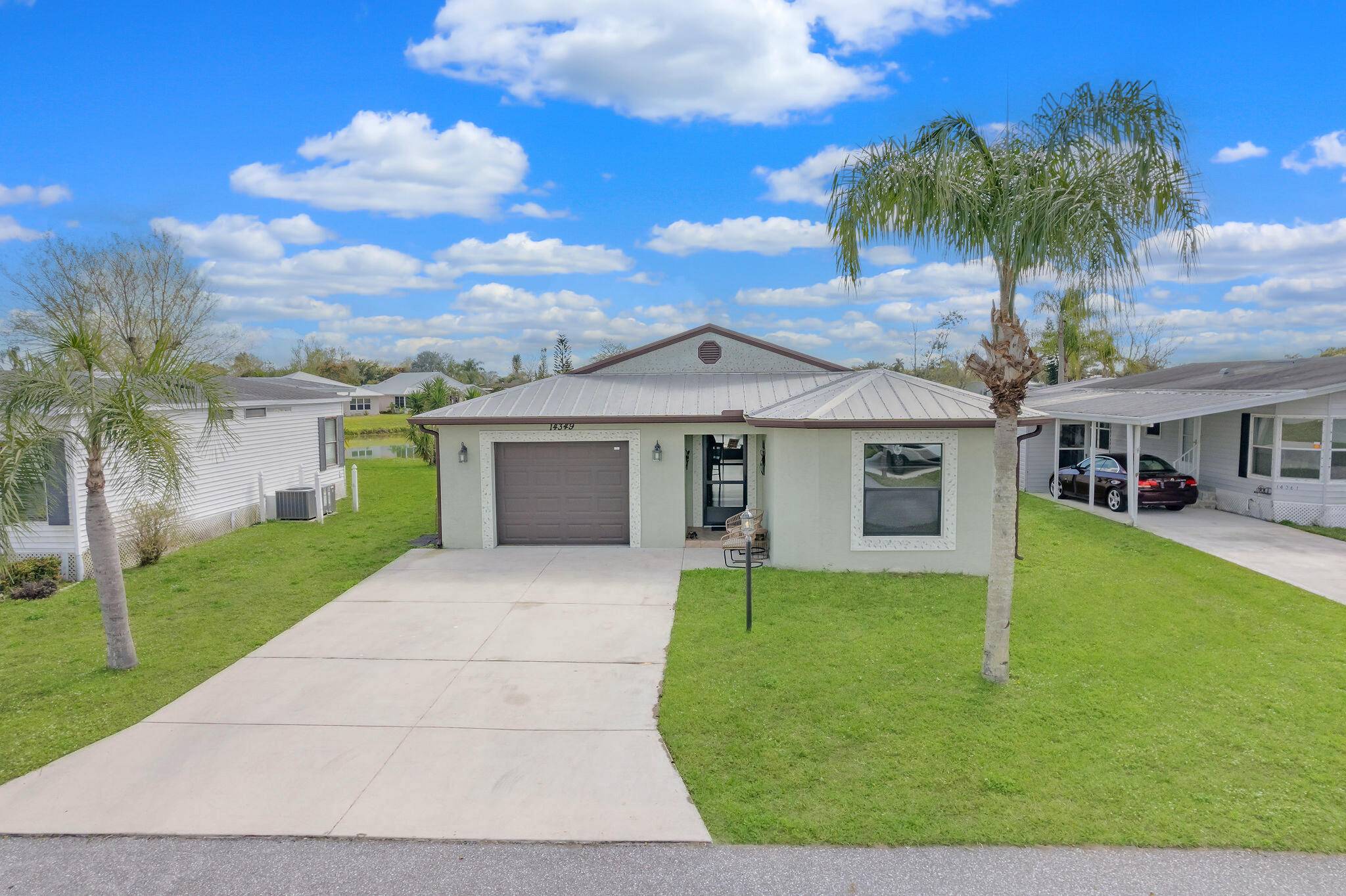 Enjoy peace of mind with IMPACT windows and additional Hurricane Panels in this charming, fully furnished minor exclusions three bedroom, two bathroom home !