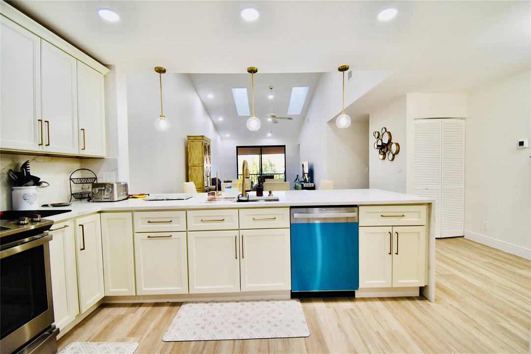 Beautifully renovated Townhouse in Boca Pointe, three bedroom, two bathroom unit with a one car garage right next to the pool available as a seasonal rental.