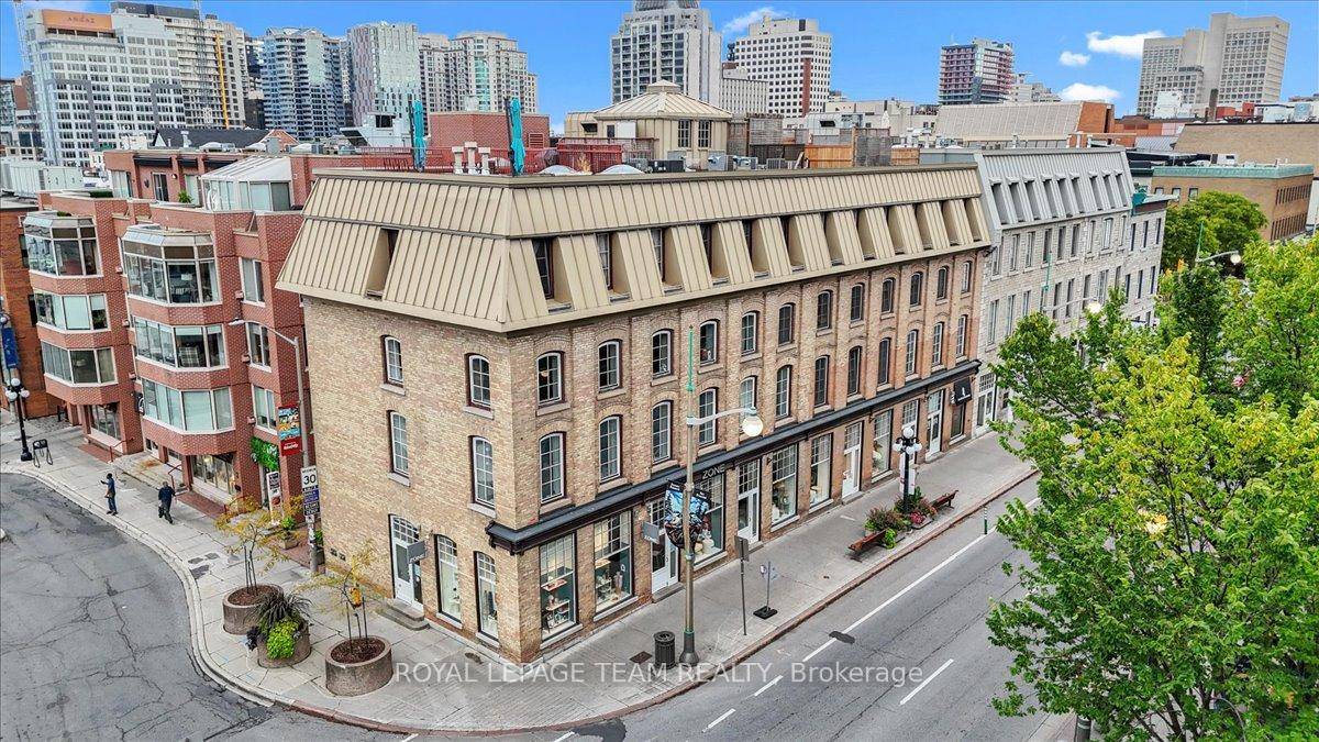 Welcome to Unit 5 at 10 Clarence Street, where history and modern living meet in the vibrant heart of Ottawa's Byward Market.