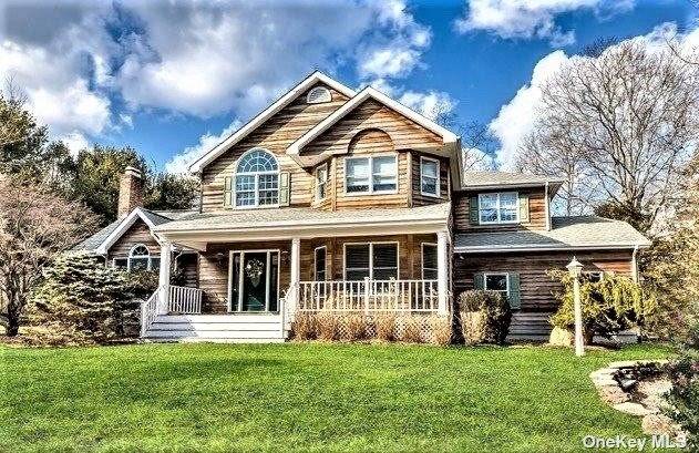 This four bedroom home with a heated pool on a full acre South of the Highway is the idyllic spot to spend the summer of 2021.