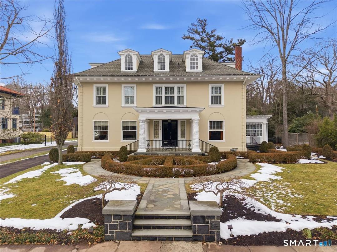 East Rock ! Directly across from Edgerton Park sits this elegant, beautifully proportioned, tastefully restored 1910 Colonial.