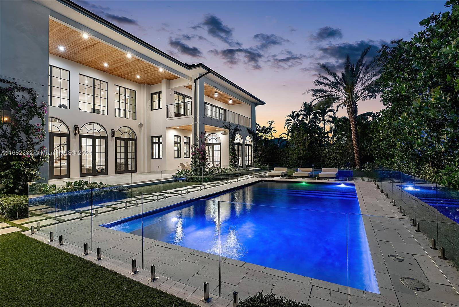 This one of a kind Mediterranean waterfront haven boasts 6 bedrooms, 6.
