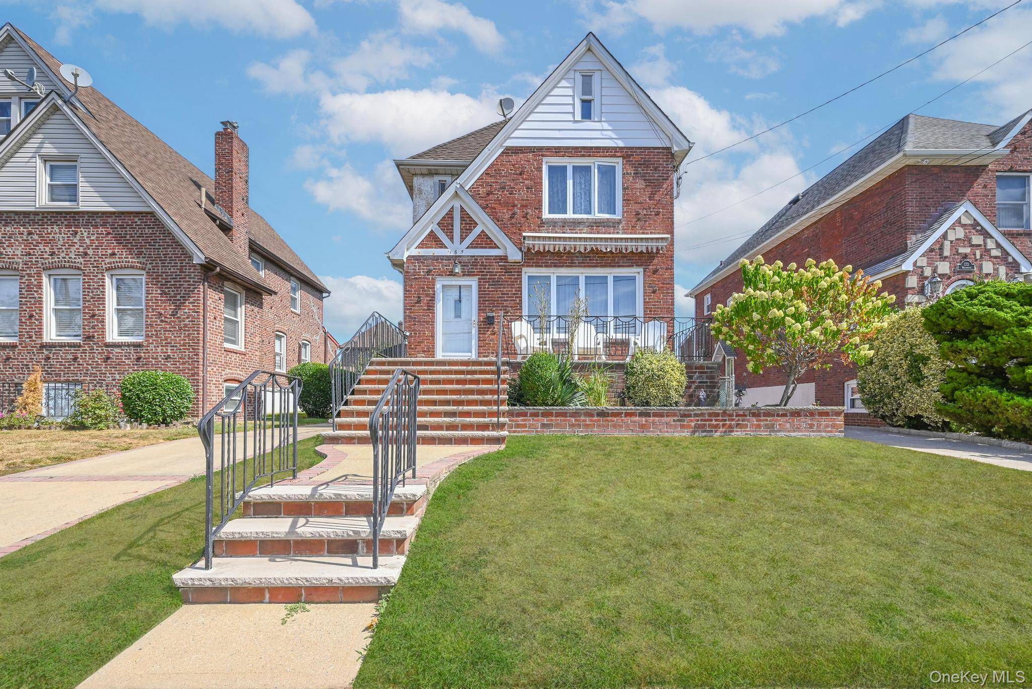Inviting Raised Front Terrace Welcomes You and Your Guests Enter Into This Tudor Located In The Village Of Lynbrook.