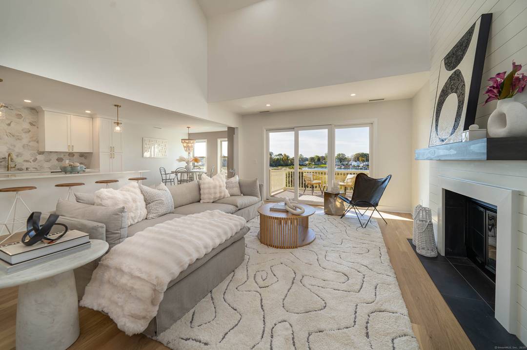 Luxurious 2 Bedroom, 2. 1 bathroom end unit condo in the Sylvan Point complex spans 1, 818 square feet of meticulously renovated water view living space.