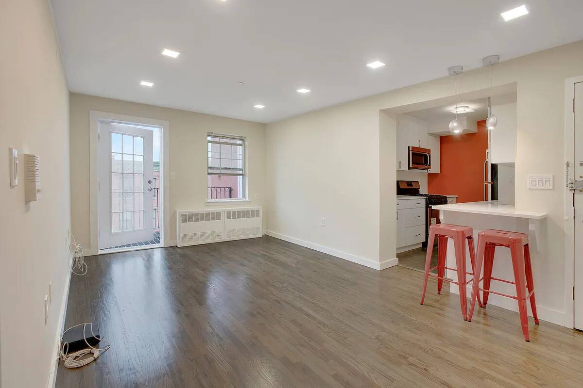 Welcome to this oversized two bedroom, one bath condominium with a private outdoor space directly off the living room, ideally situated on the border of Clinton Hill and Bedford Stuyvesant.