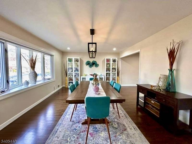 This refined single family bi level home offers 3 bedrooms and 3 full bathrooms, blending modern upgrades with timeless appeal.