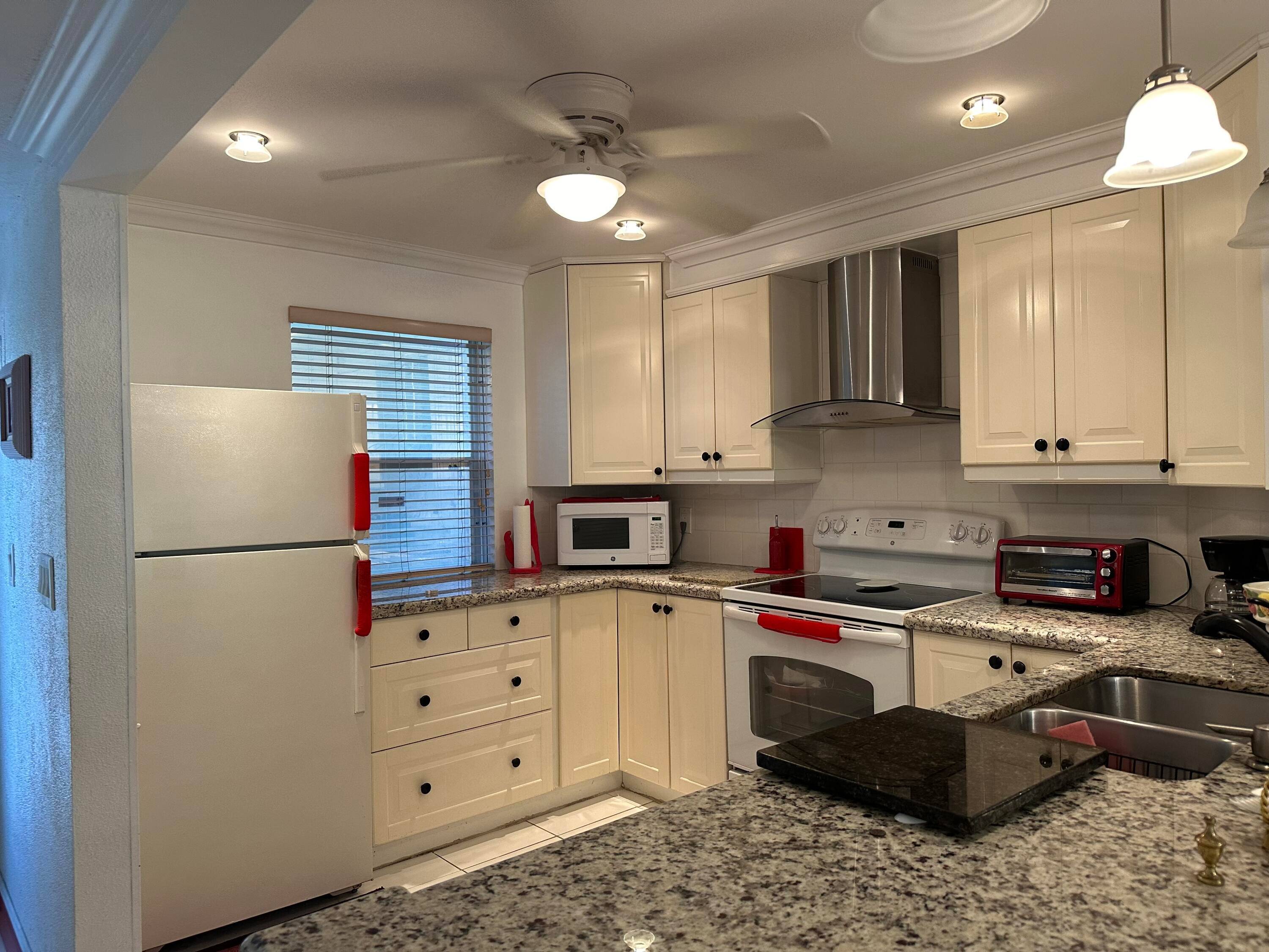 Your new paradaise in sunny Florida, Open Concept floor plan, 2 bedroom 2 bath condo unit, hurricane impact glass windows, tile floor, split bedroom, newer A C and water heater.