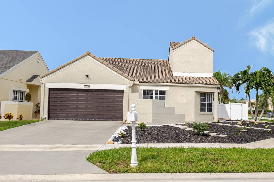 Well kept West Boca home featuring 3 bedrooms and 2 bathrooms on a fully fenced corner lot with a spacious backyard.