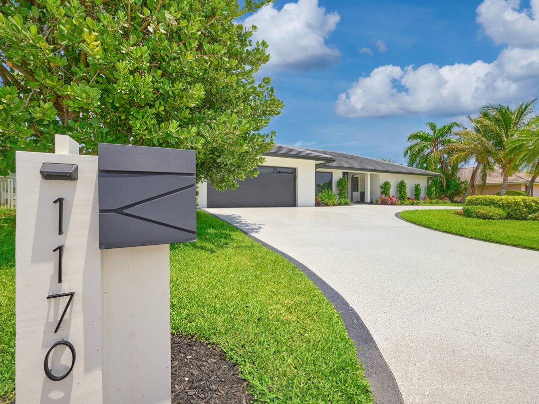 Welcome to 1170 Fairview Ln, a masterfully redesigned and completely remodeled waterfront estate on the highly coveted Singer Island.