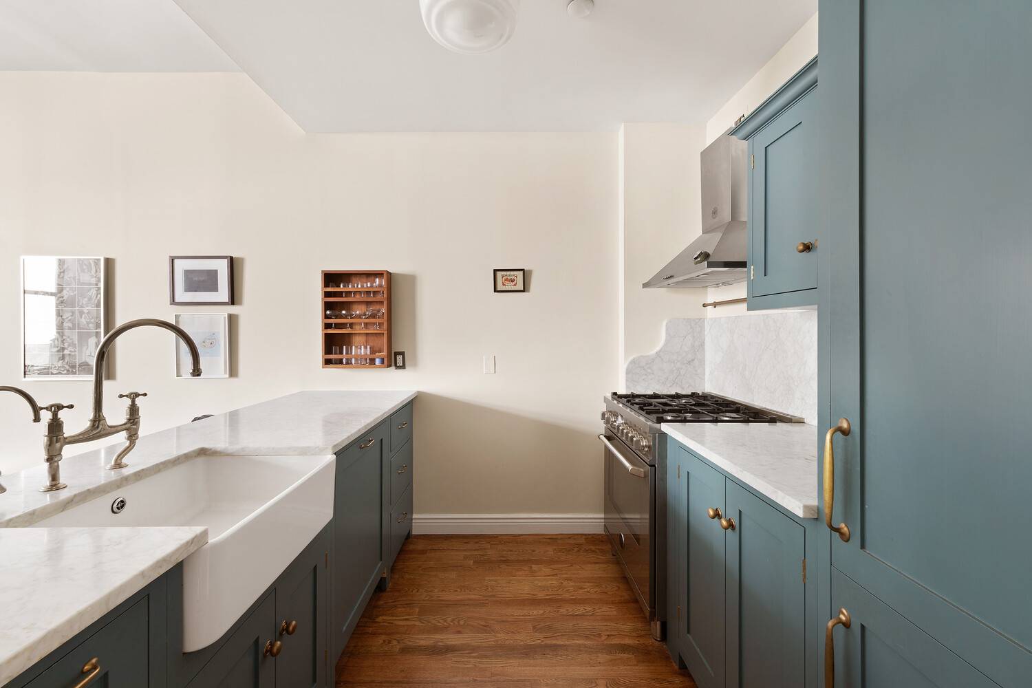 This beautifully renovated one bedroom, one and a half bath residence blends timeless craftsmanship with modern luxury.