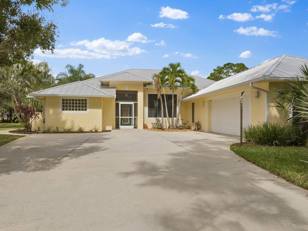 Unique opportunity to own a custom built home with a FULL GUEST HOME !