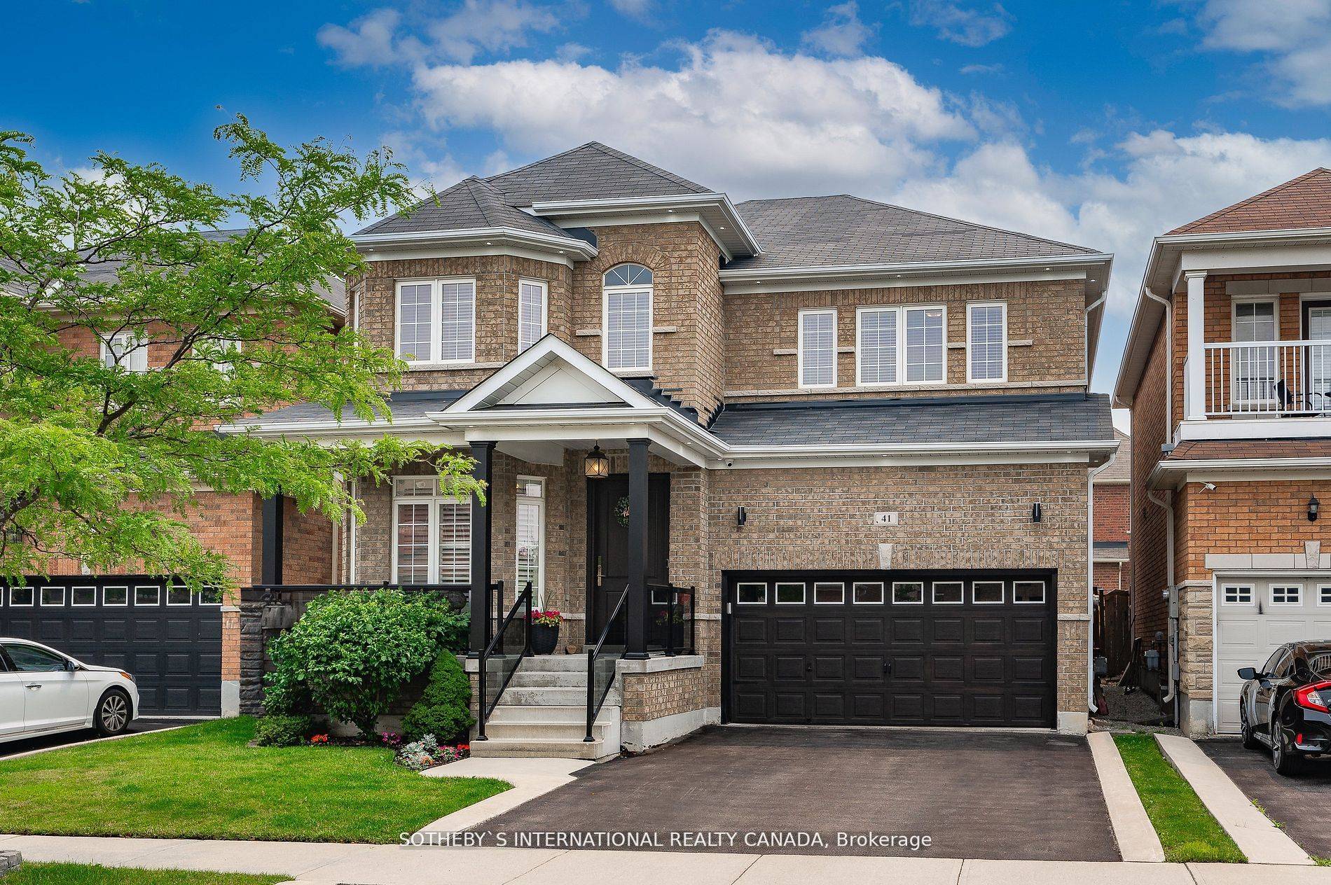 This heavily upgraded Arista Waterfront model home features a spacious foyer upon entering which transitions to an open living room filled with natural light cascading throughout.