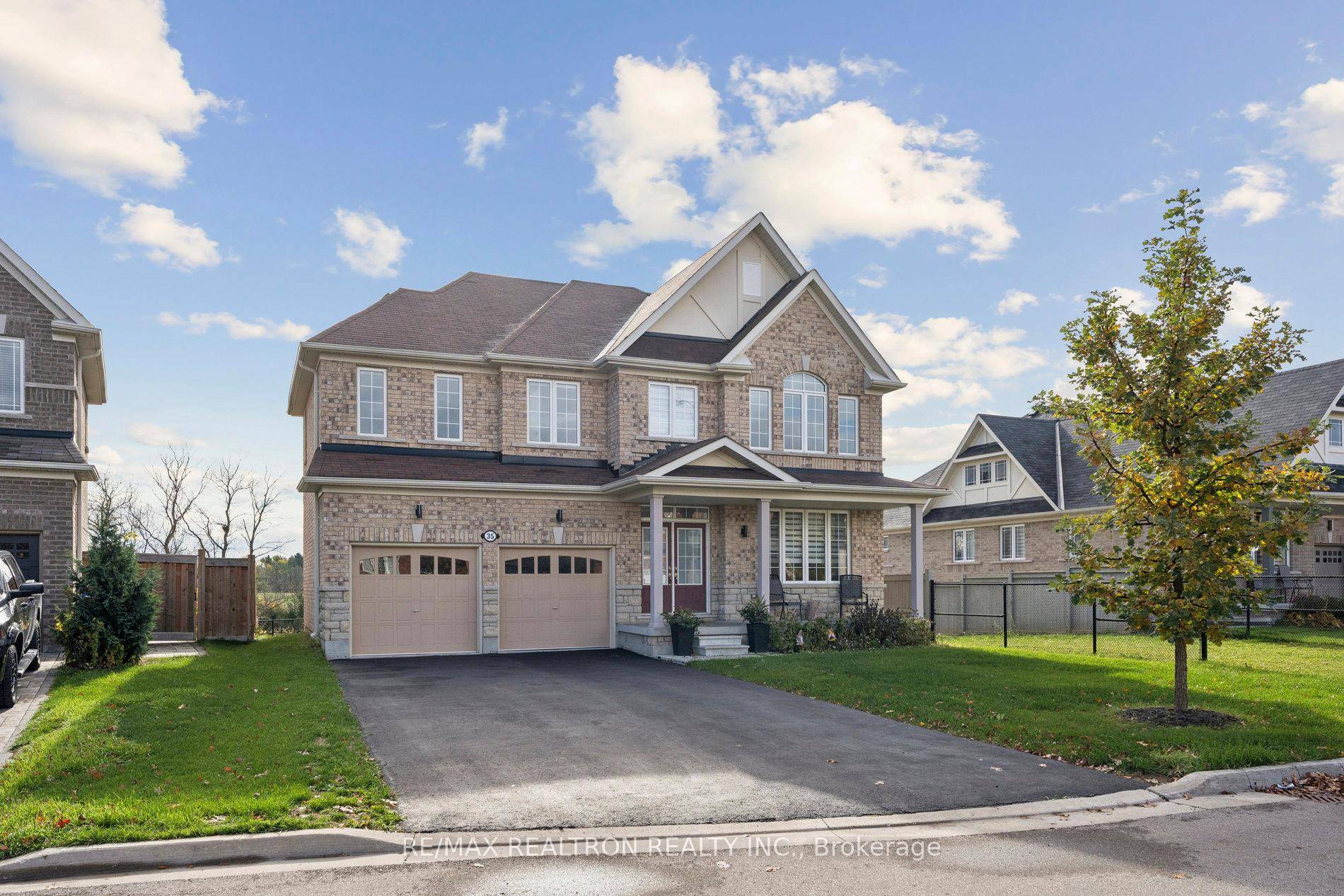Welcome to 35 Webb Trail a beautifully finished, all brick home ideally situated on a quiet street and one of the most premium lots in the area.