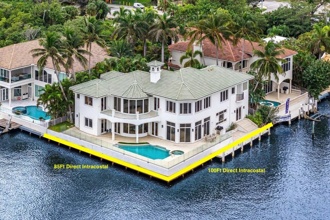 Privately Gated Waterfront Estate with Unmatched Intracoastal Views Nestled on an oversized point lot, this extraordinary estate boasts sweeping, unobstructed Intracoastal views across a stunning 600 foot wide expanse.