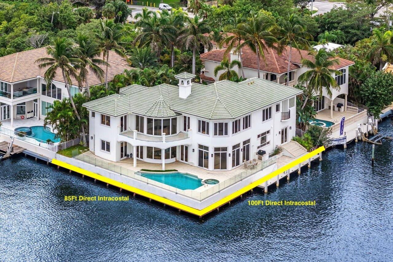 Privately Gated Waterfront Estate with Unmatched Intracoastal Views Nestled on an oversized point lot, this extraordinary estate boasts sweeping, unobstructed Intracoastal views across a stunning 600 foot wide expanse.