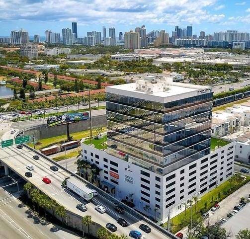 Prime Investment at Beacon Tower Aventura 6th floor commercial unit featuring 3 private offices, a spacious conference room and abundant natural light.