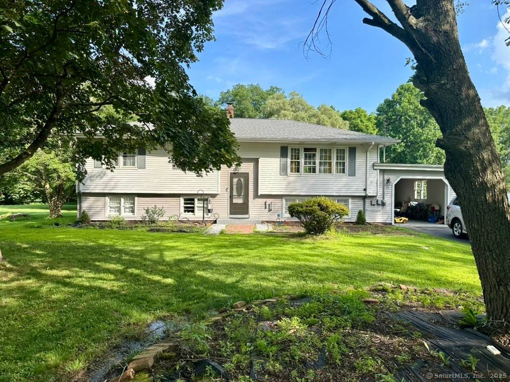 Come and experience comfortable living in a raised ranch style residence nestled on almost one acre of level, open land.