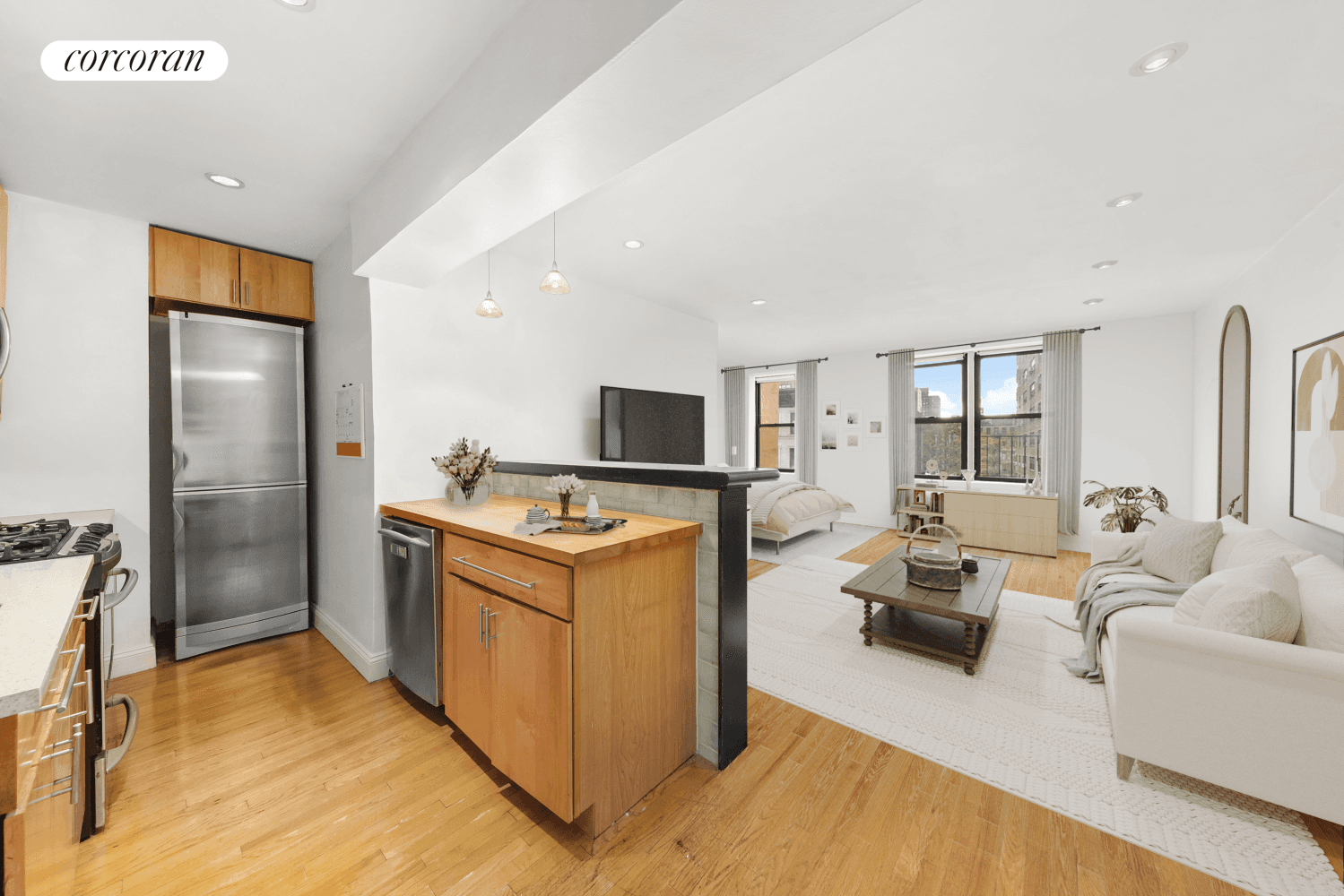 Residence 5D is a spacious alcove studio, lined with three oversized windows offering sunny southern exposures.