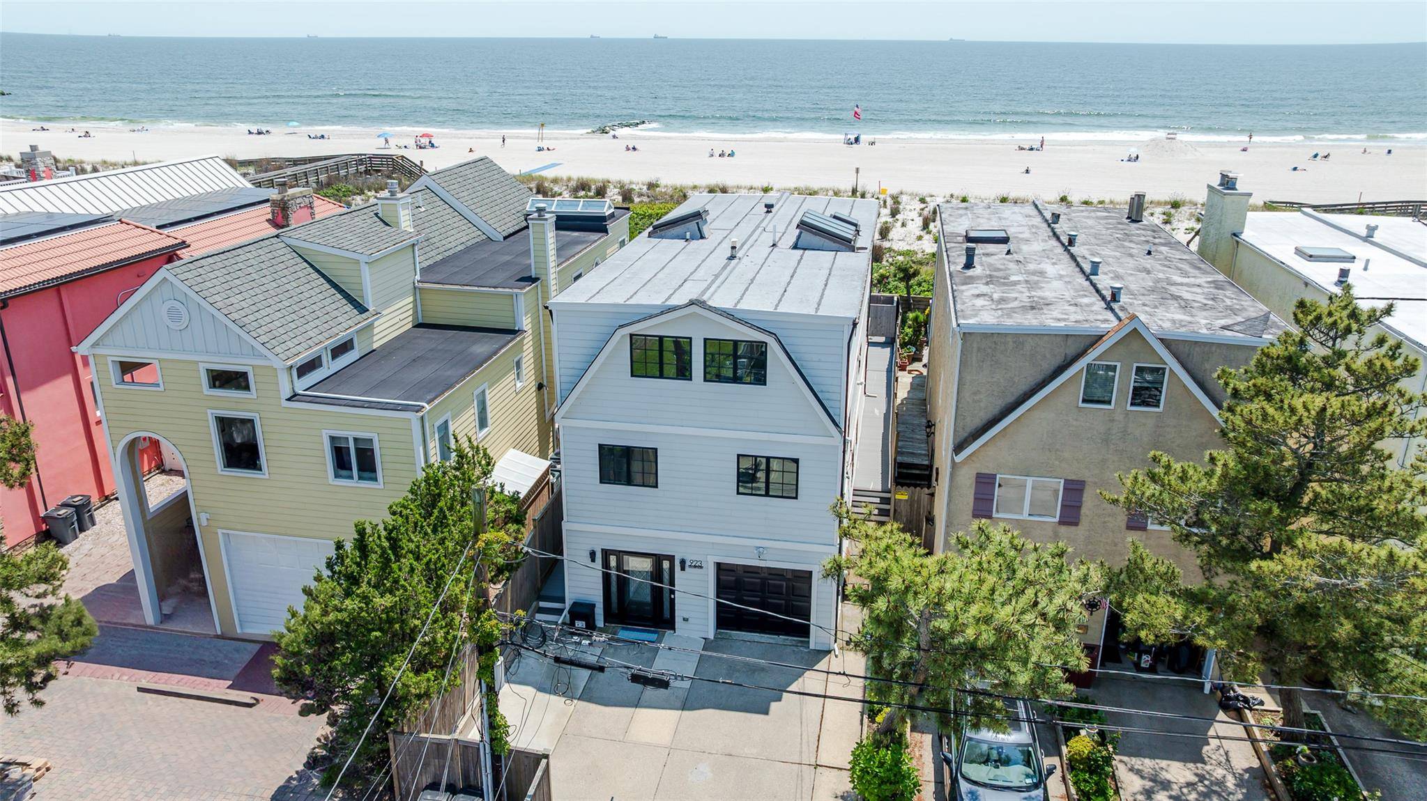 Step into coastal luxury with this impeccably updated 6 bedroom, 4 full bath, direct oceanfront home.