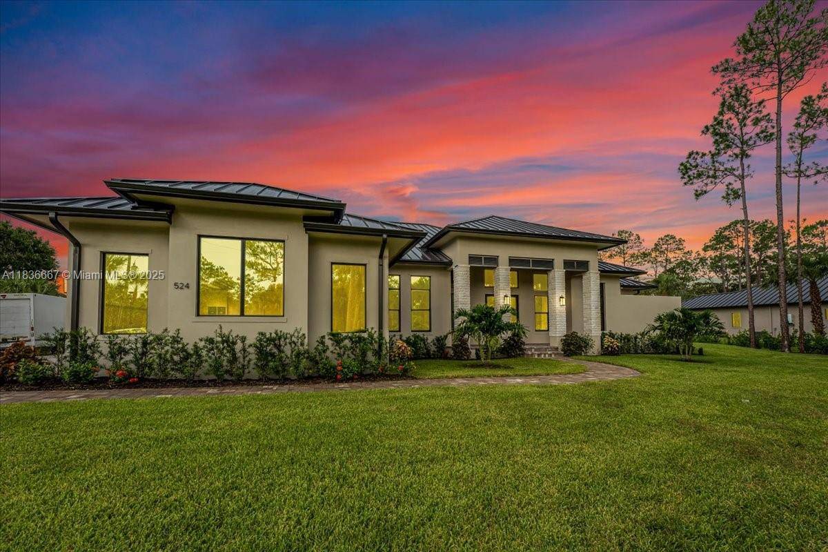 Nestled on 2. 5 acres of 100 upland in Golden Gate Estates, this home offers luxury, privacy, and functionality.